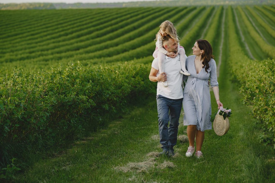 happy family in vineyard